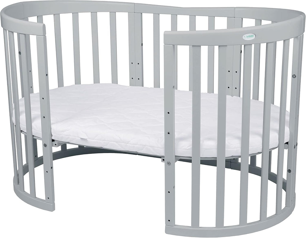 Waldin Oval Baby-Bett Mitwachsend Komplett Set 7in1, Gitterbett, Kinderbett mit Matratze, Wickelkommode, Beistellbett, Holz Weiß