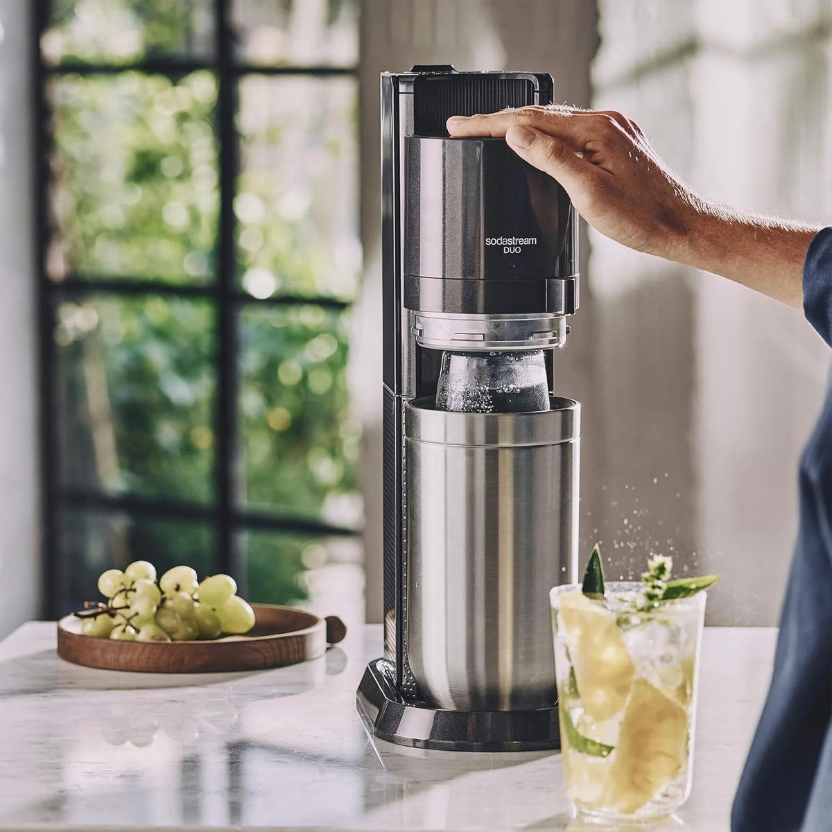 SodaStream Duo Sparkling Water Machine for Glass Jug | Pack of 2 Glass Jugs 1L + 1 Bottle 1L Dishwasher Safe + 1 60L Gas Refill Clip On | Black [Amazon Exclusive]